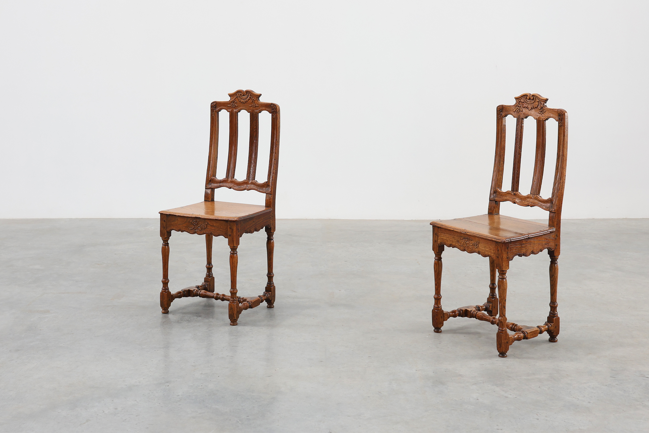 Pair of Antique carved oak side chairs, France 18th century thumbnail